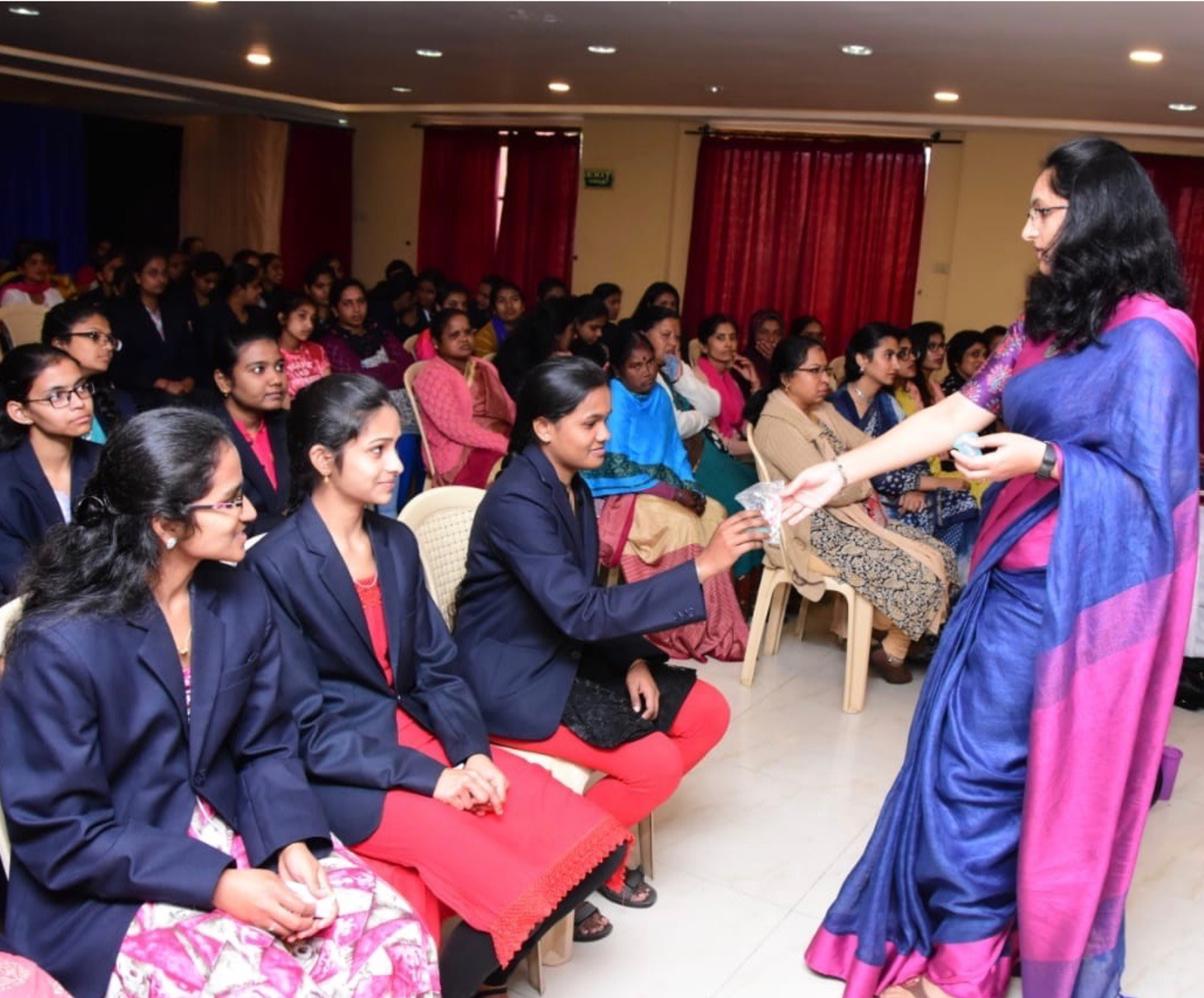 Nilgiris West first lady Sunitha Bala with JSS College of Pharmacy students